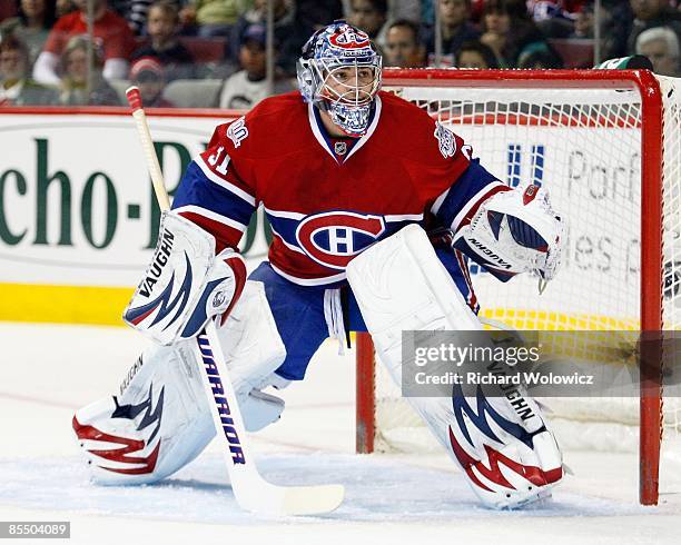 Carey Price of the Montreal Canadiens watches play during the game against the Edmonton Oilers at the Bell Centre on March 10, 2009 in Montreal,...