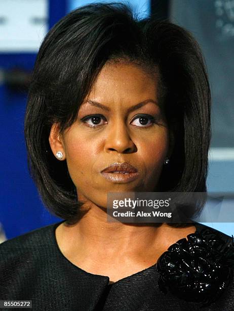First lady Michelle Obama speaks to students during her visit to Anacostia High School March 19, 2009 in Washington, DC. The first lady had a...