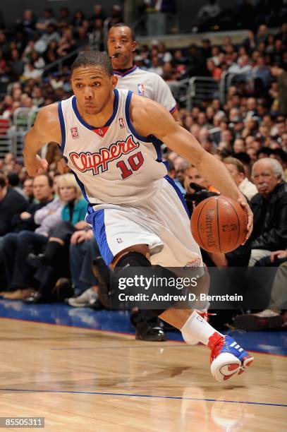 Eric Gordon of the Los Angeles Clippers drives to the basket during the game against the Cleveland Cavaliers on March 10, 2009 at Staples Center in...