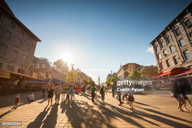 busy street in old montreal quebec canada - bonsecours market stock pictures, royalty-free photos & images