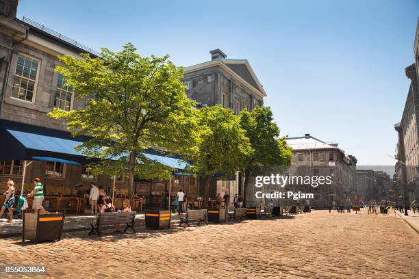 busy street in old montreal quebec canada - bonsecours market stock pictures, royalty-free photos & images