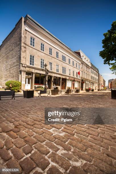 cobblestone streets in old montreal quebec canada - bonsecours market stock pictures, royalty-free photos & images