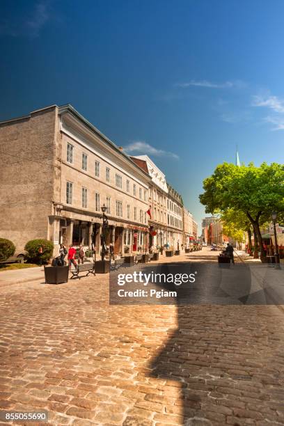 cobblestone streets in old montreal quebec canada - bonsecours market stock pictures, royalty-free photos & images