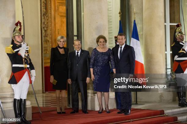 French President Emmanuel Macron and his wife Brigitte Trogneux welcome their guests for a State dinner offered in honor of Lebanese President Michel...