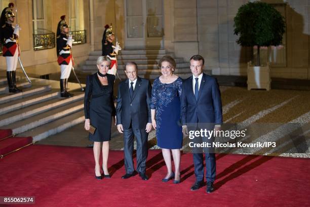 French President Emmanuel Macron and his wife Brigitte Trogneux welcome their guests for a State dinner offered in honor of Lebanese President Michel...