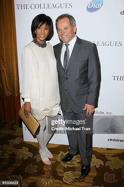 Chef Wolfgang Puck and wife Gelila Assefa arrive to "The Colleagues" 21st Annual Spring luncheon held at The Beverly Wilshire Hotel on March 19, 2009...