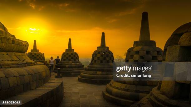 borobudur at dusk in central java, indonesia. - provincia de java central fotografías e imágenes de stock