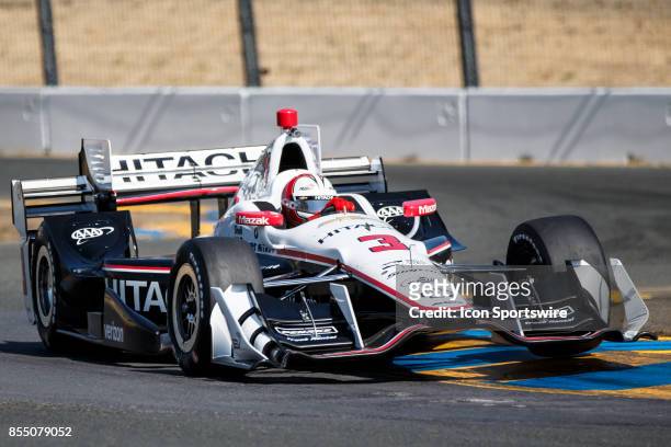 Helio Castroneves in the Chevrolet powered, Hitachi Team Penske IR12 at the bus stop during warm-up for the Verizon Indycar Series, GoPro Grand Prix...
