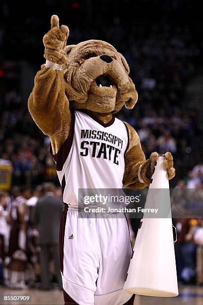 The Mississippi State Bulldogs mascot performs during a break in the game against the Washington Huskies during the first round of the NCAA Division...