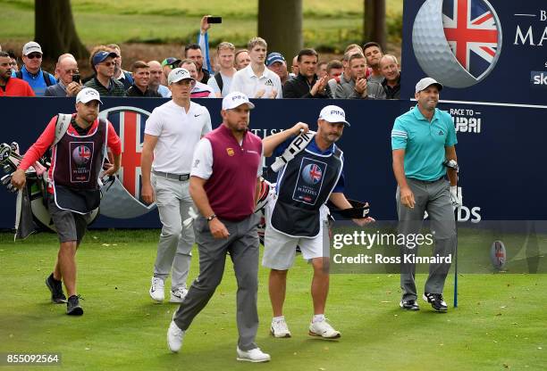 Lee Westwood of England, Alex Noren of Sweden and Sergio Garcia of Spain walk down the 6th hole during day one of the British Masters at Close House...