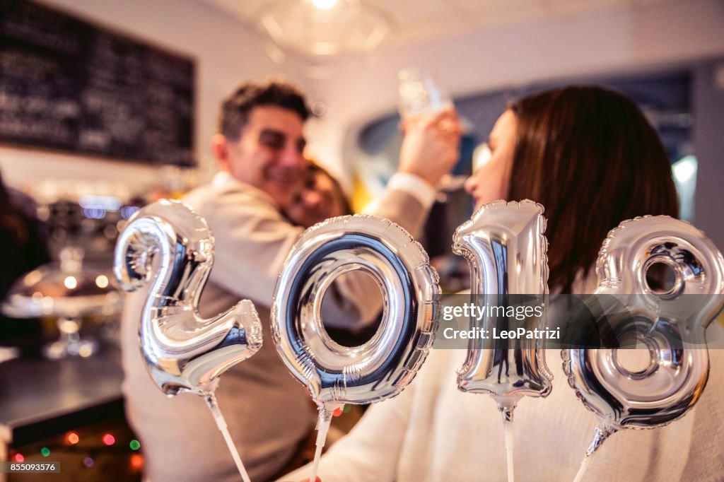 Happy family celebrate New Year's Eve