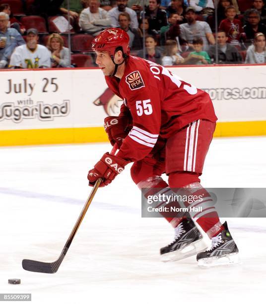 Ed Jovanovski of the Phoenix Coyotes skates up ice with the puck against the San Jose Sharks on March 17, 2009 at Jobing.com Arena in Glendale,...