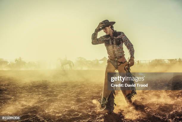a dusty rodeo in central queensland, australia. - cowboy bildbanksfoton och bilder