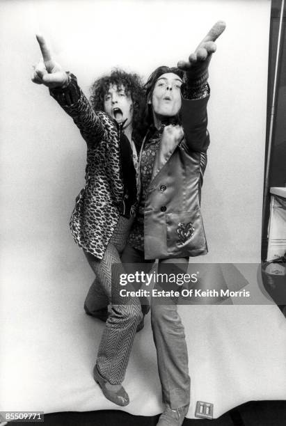 Photo of Marc BOLAN and T REX and Mickey FINN; studio, posed with Mickey Finn