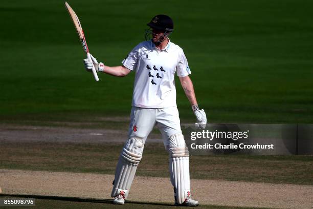 Luke Wells of Sussex celebrates his half century during day four of the Specsavers County Championship Division Two match between Sussex and...