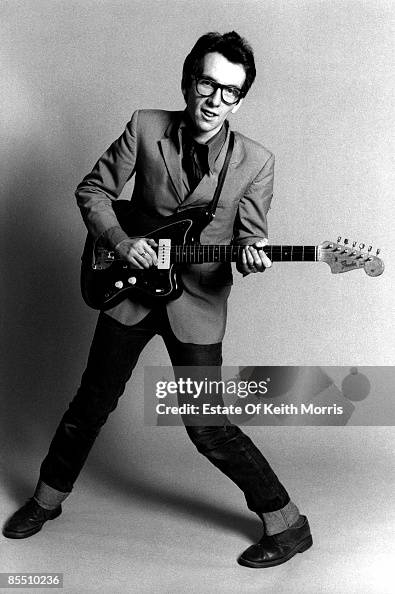 Photo of Elvis COSTELLO; studio, posed - "My Aim is True" cover shoot