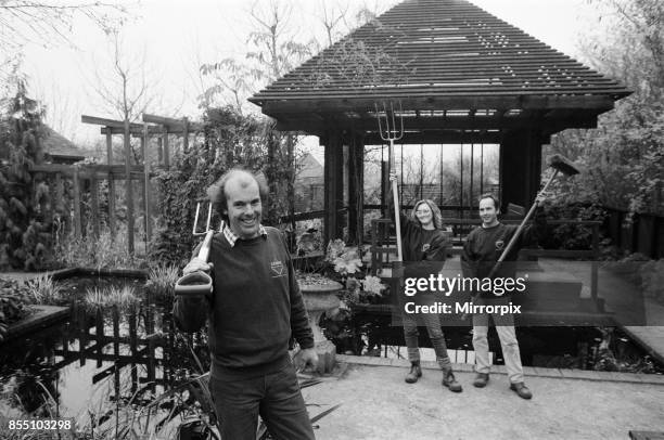 Head gardener Mr Brian Gilbride celebrates the success of Telford in the 1989 Britain in Bloom competition. He is pictured in the town's Town Park,...