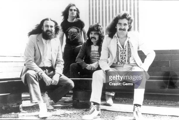 Photo of Ozzy OSBOURNE and BLACK SABBATH; L-R: Bill Ward, Ozzy Osbourne, Tony Iommi, Geezer Butler - posed, group shot