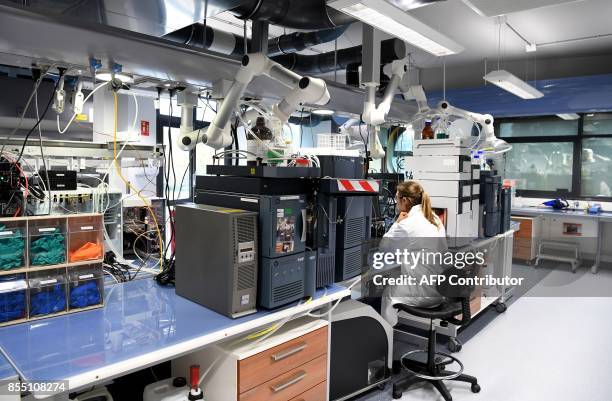 Woman works at Allergan's R&D and global production site, on September 25, 2017 in Pringy. Allergan is a global pharmaceutical company focused on...