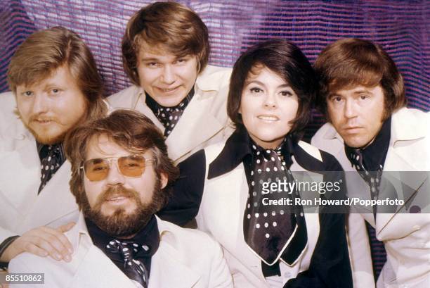 American singer Kenny Rogers posed 2nd left with rock band The First Edition in London circa 1969. Musicians are, from left, Mickey Jones, Kenny...