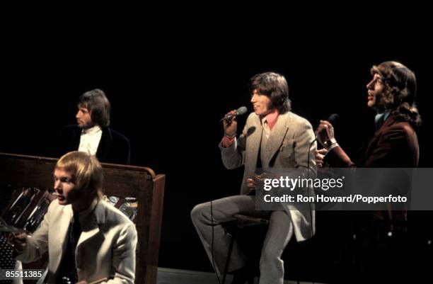 Pop group The Bee Gees perform on the set of a pop music television show in London in 1968. Members of the band are, from left, drummer Colin...