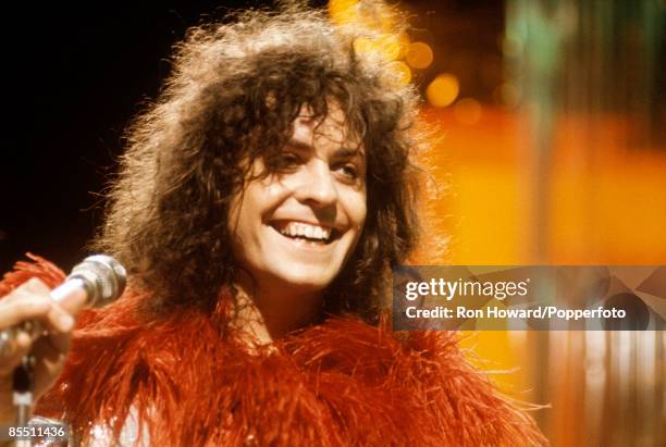 Singer and guitarist Marc Bolan of English rock band T. Rex performs on the set of a pop music television show in London circa 1972.