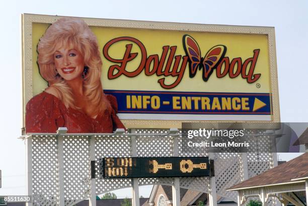 The entrance sign for Dollywood, the theme park co-owned by Dolly Parton, Pigeon Forge, Tennessee.