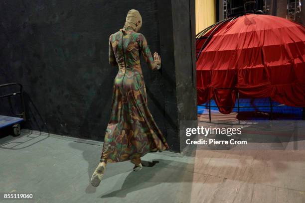 Dancer of the National Academic Bolshoi Opera and Ballet Theater of the Republic of Belarus warms up prior to a representation of The Little Prince...