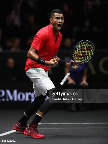 Nick Kyrgios of Team World celebrates winning a game against Roger Federer of Team Europe during the final day of the Laver Cup at the O2 Arena on...