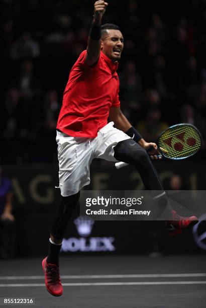 Nick Kyrgios of Team World celebrates winning a game against Roger Federer of Team Europe during the final day of the Laver Cup at the O2 Arena on...