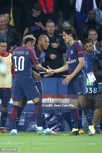 Neymar Jr of PSG celebrates his goal with Kylian Mbappe, Edinson Cavani during the UEFA Champions League group B match between Paris Saint-Germain...