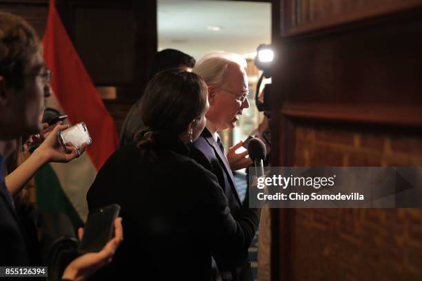 Heath and Human Services Secretary Tom Price is persued by reporters after participating in an event to promote the flu vaccine at the National Press...