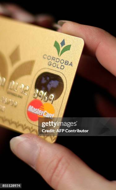 The new Cordoba gold pre-paid credit card is pictured during its official launch in London, on August 11, 2008. The card is the first Sharia...