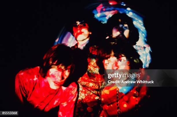 Photo of PINK FLOYD; Back L-R: Syd Barrett, Nick Mason. Front L-R: Roger Waters, Rick Wright - posed, studio, group shot, in psychedelic lighting