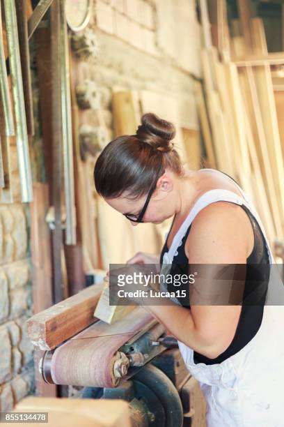 female carpenter - finanzwirtschaft und industrie stock pictures, royalty-free photos & images