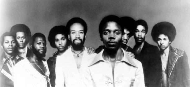 Photo of EARTH WIND & FIRE; L to R: Johnny Grahm, Larry Dunn, Andrew Woolfolk, Al McKay, Maurice White, Philip Bailey, Verdine White, Freddy White,...
