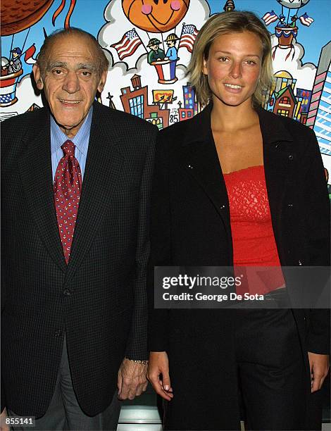 Actor Abe Vigoda and model Bridget Hall attend the Muscular Dystrophy Association's 2002 Muscle Team gala and auction January 8, 2002 at Chelsea...