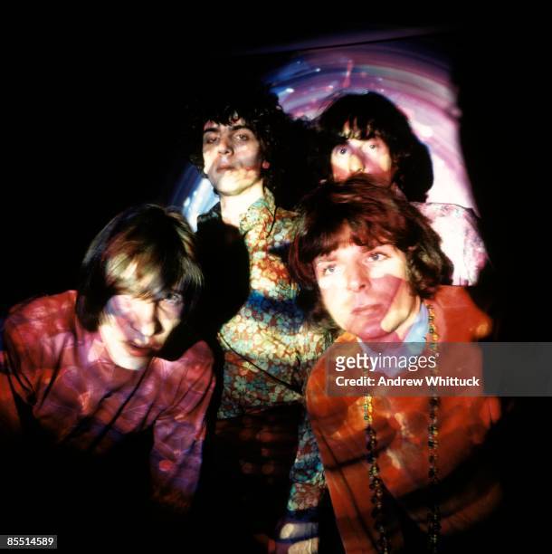 Photo of Syd BARRETT and PINK FLOYD; Back L-R: Syd Barrett, Nick Mason. Front L-R: Roger Waters, Rick Wright - posed, group shot, psychedelic lighting