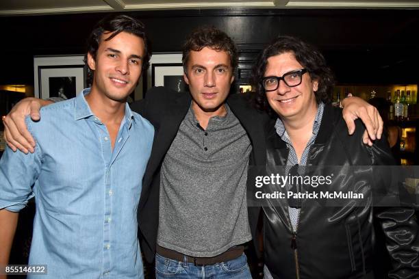 Renato Freitas, Fabian Basabe and Manny Hernandez attend Cocktails with Fabian Basabe at Omar's on September 13, 2017 in New York City.