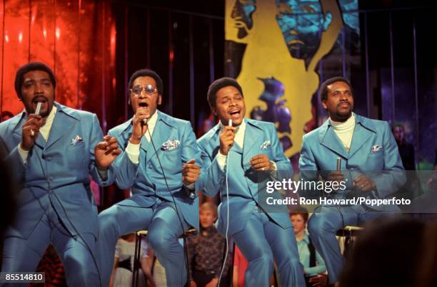 American Vocal Group Four Tops perform on the set of a pop music television show in London circa 1970. Members of the group are, from left, Lawrence...