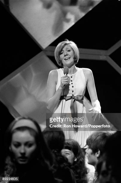 English singer Cilla Black performs on the set of a pop music television show in London circa 1970.