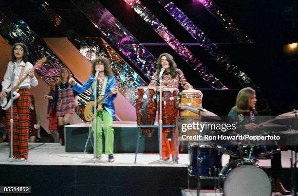 English rock band T. Rex perform on the set of a pop music television show in London circa 1970. Members of the group are, from left, Steve Currie ,...