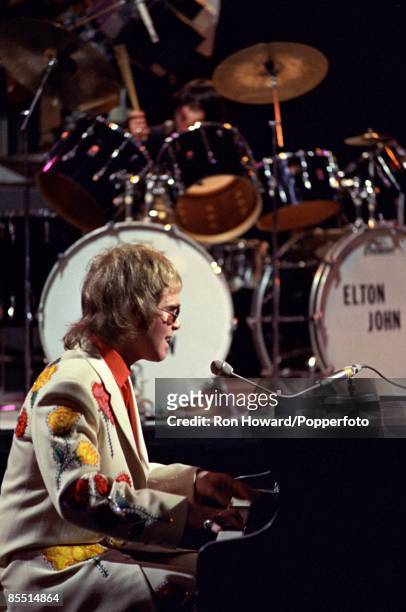 English singer and pianist Elton John performs 'Your Song' on the set of a pop music television show in London in January 1971.