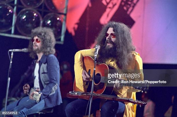 From left, Jeff Lynne and Roy Wood of the Electric Light Orchestra perform on the set of a pop music television show in London circa 1970.