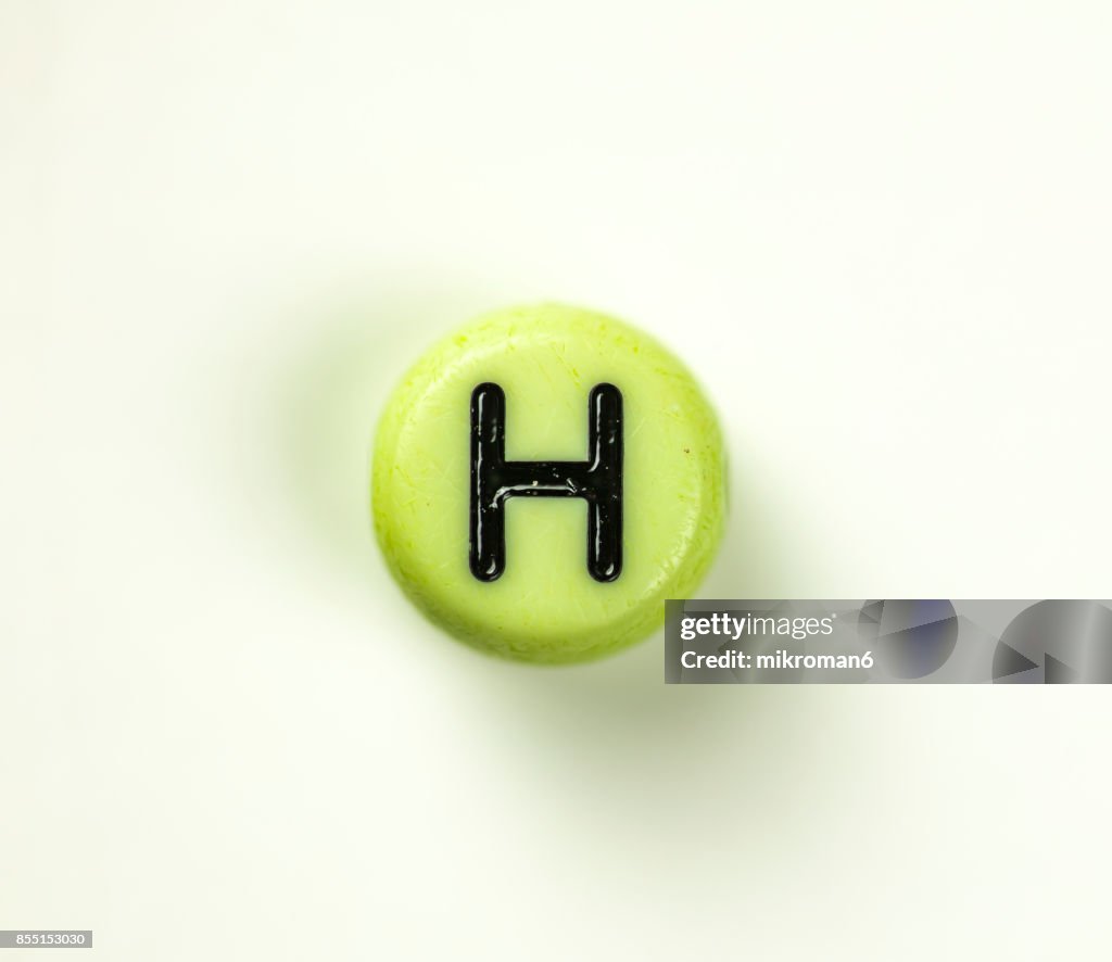 Directly Above Shot Of Plastic Capital Letter H On white background