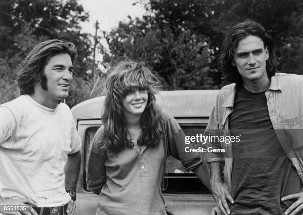 Photo of Laurie BIRD and Dennis WILSON and James TAYLOR; w/ Dennis Wilson & Laurie Bird in "Two Lane Blacktop"