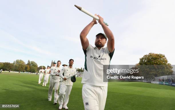 Joe Leach, the Worcestershire captain leads his team off the pitch after winning the Specsavers County Championship division two title after their...