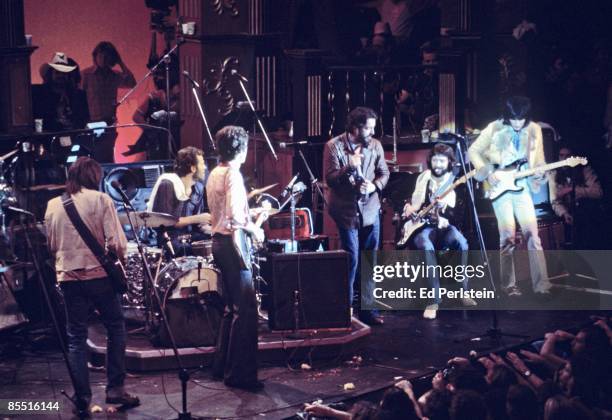 Photo of BAND, Eric Clapton @ The Band's Last Waltz - Winterland Arena, San Francisco - - L-R: Neil Young, Levon Helm, Robbie Robertson, Paul...