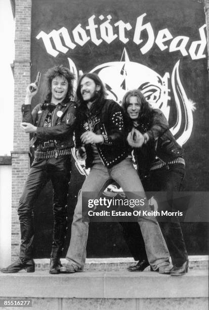 Photo of LEMMY and MOTORHEAD; posed, group shot - L-R: Philthy Animal, Lemmy, 'Fast' Eddie Clarke