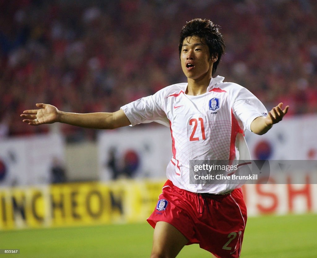 Ji Sung Park of South Korea celebrates scoring the winning goal